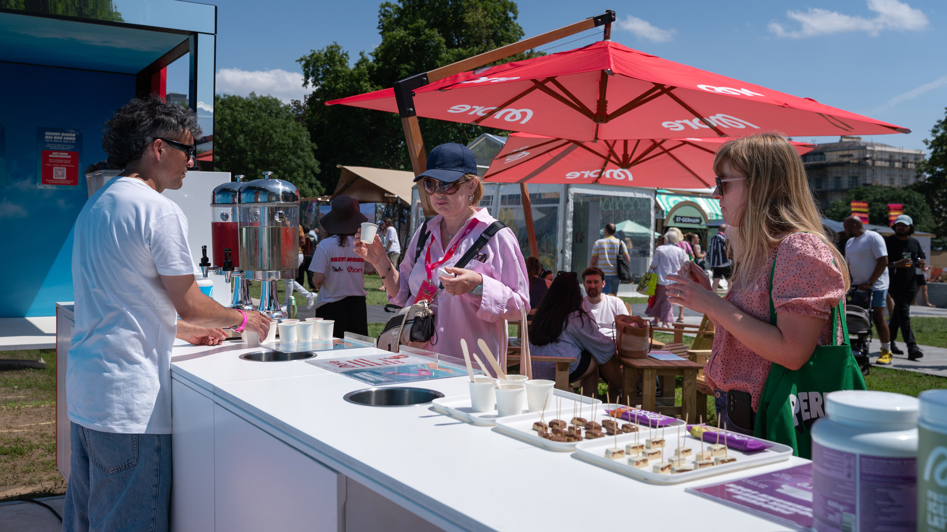 Visitors sampling More Nutrition products at an outdoor brand activation during Taste of London 2026